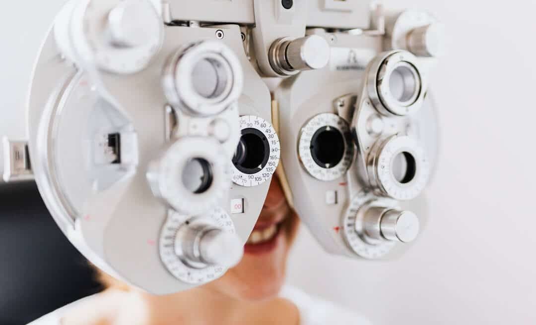 Patient getting an eye exam in Newport Beach