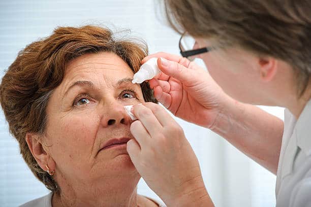 Senior getting dry eye treatment at Newport Beach.